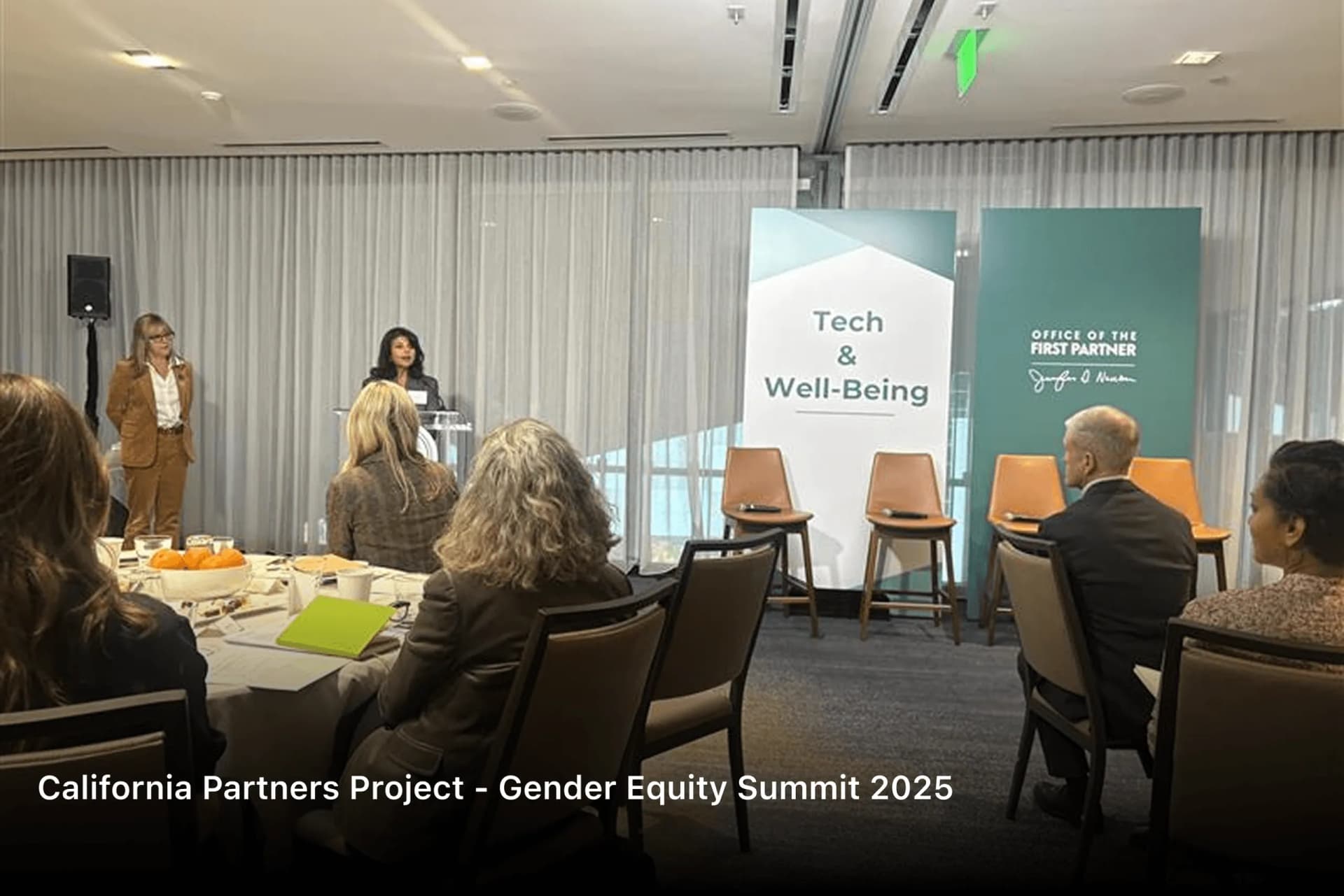Speakers addressing seated guests at the Tech & Well-Being session of the California Partners Project Gender Equity Summit 2025